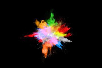 abstract colored dust explosion on a black background.abstract powder splatted background,Freeze motion of color powder exploding/throwing color powder, multicolored glitter texture.