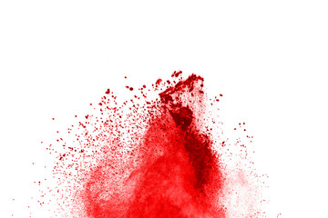 Freeze motion of red powder exploding, isolated on white background. Abstract design of red dust cloud. Particles explosion screen saver, wallpaper