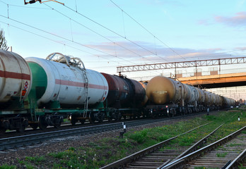 Fototapeta na wymiar Rail cars carry crude oil and ethanol. Railway logistics explosive cargo.