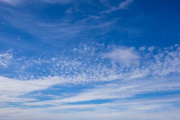 Naklejka na ściany i meble Blue sky and white clouds. Cloudy sky natural background