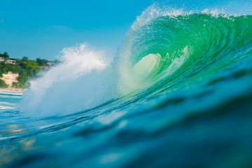 Big green wave in ocean. Breaking wave in Bali