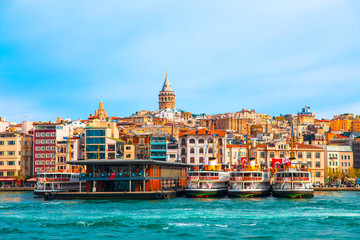 Galata Tower in istanbul City of Turkey.  View of the Istanbul City of Turkey with bosphorus, seagulls and boats.