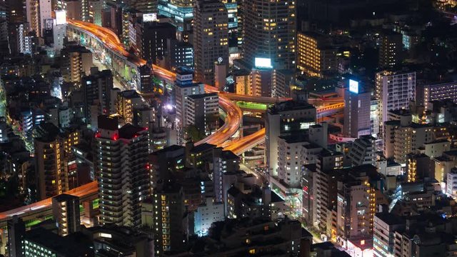 time lapse of the Metropolitan Expressway junction road and city at night, Tokyo, Japan