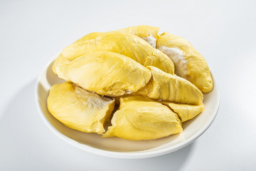 A dish of fresh ripe yellow delicious durian flesh