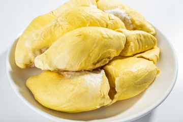 A dish of fresh ripe yellow delicious durian flesh