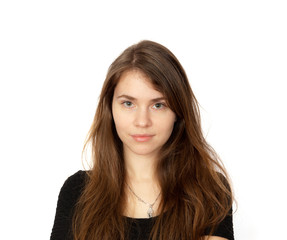 Portrait of brown-haired woman with long hair on white background