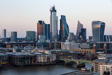 Fototapeta na wymiar City of London skyscrapers and the River Thames at sunset