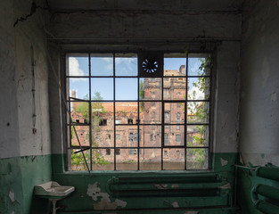 Szczecin.  abandoned factory premises with historic architecture outside the window - obrazy, fototapety, plakaty