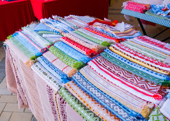 Multicolor cotton towels at souvenir market at festival