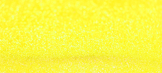 Yellow glitter shiny texture background for christmas, Celebration concept.