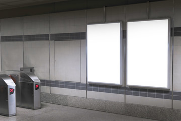 Blank billboard in subway or metro station, Useful for advertising.