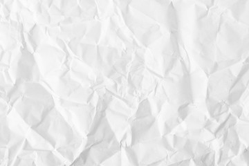 White crumpled paper texture background.