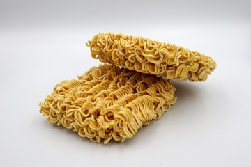 Rectangular noodles on a square, isolated on a white background