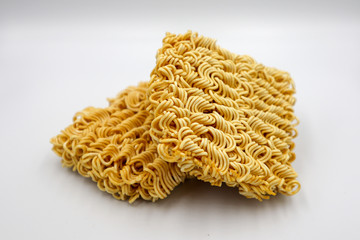 Rectangular noodles on a square, isolated on a white background