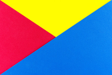 Blue, red, yellow gradient color with texture from real foam sponge paper for background, backdrop or design.