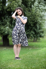 Beautiful girl in dresses for a walk