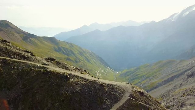 Road to the Stelvio mountain pass in Italy. Aerial view of the mountain bends.