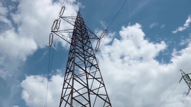 overhead power line, electric power transmission - tracking shot