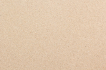 Fototapeta na wymiar Brown paper background. Empty cardboard texture. Craft sheet