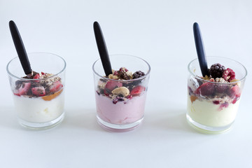Yogurt with fresh fruits and fibers, isolated on white background