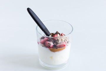 Yogurt with fresh fruits and fibers, isolated on white background