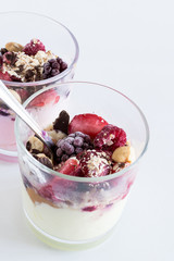 Yogurt with fresh fruits and fibers, isolated on white background