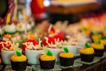 Catering sweets, dessert buffet, various kinds of cakes on event or wedding reception
