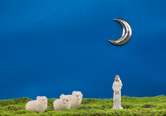 Ramadan, a figure of an Arab and toy sheep