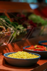 Salad bar with vegetables in the restaurant, healthy food concept