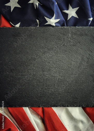 American flag on a black background. Space for text.