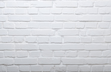 Fototapeta premium Malowane na biało autentyczne tło ściany z cegły