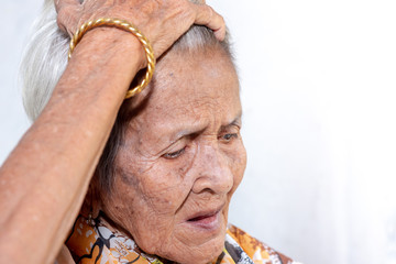 The old woman's felling lonely.(dementia and Alzheimer’s disease)