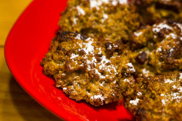 homemade oatmeal cookies with coconut, dates and powdered sugar