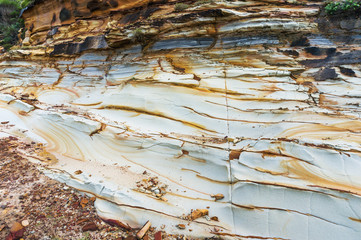 Close up of white rock with layered details and cracks