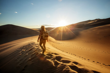 A tourist traveled through the desert - Powered by Adobe