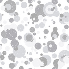 Modern vector abstract seamless geometric pattern with  circles in retro scandinavian style. Neutral gray and white colored shapes with worn out texture.