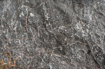 Rock texture and surface background. Cracked and weathered natural stone background.
