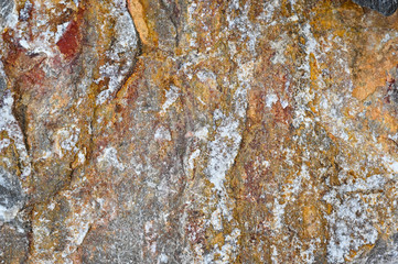 Rock texture and surface background. Cracked and weathered natural stone background.