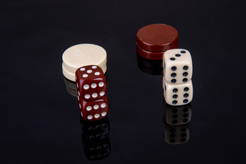 Dice game with dice and game pieces from backgammon