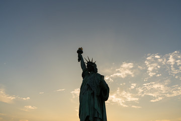 Fototapeta premium Statue of liberty on background of evening sky.