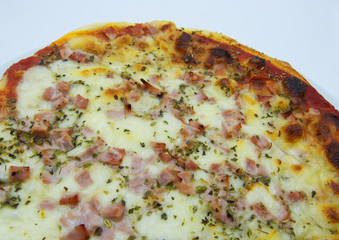 Pizza with ham and mozzarella (pizza al prosciutto) traditional italian food