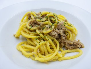 Spaghetti with tuna on white background, italian food