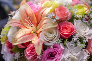 Colorful plastic flower bouquet for background
