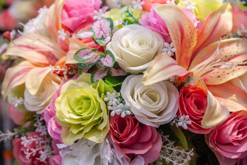 Colorful plastic flower bouquet for background