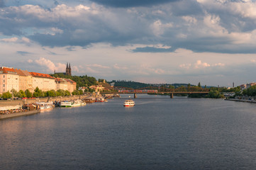 Obraz premium Prague cityscape with cruise boat on Vltava river