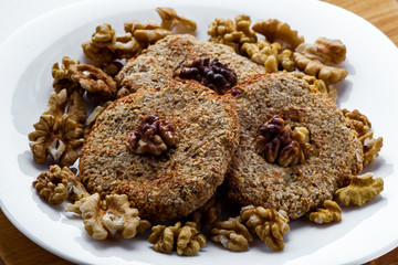 Oatmeal cookies with honey and walnuts. Menu for a bakery. Close-up