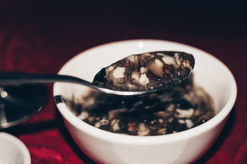 Eating authentic bird's nest soup also known as 