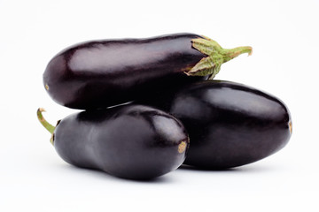 Three fresh eggplant isolated on white background