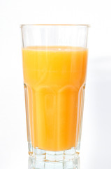 Orange juice glass, isolated on white background, vertical format