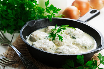 Chicken meatballs in milk sauce
